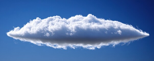 Fototapeta premium Single puffy cloud against clear blue sky on a sunny day