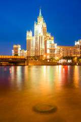 Fototapeta premium The high—rise building on Kotelnicheskaya Embankment is one of the legendary Stalinist skyscrapers located at the confluence of the Yauza River with the Moskva River. Moscow
