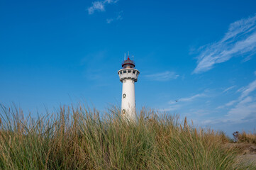 Lighthouse in the dunes of the Dutch town of Egmond aan Zee