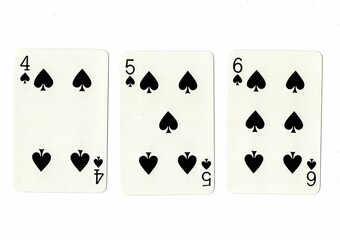 A hand of playing cards showing a run of three on a white background.