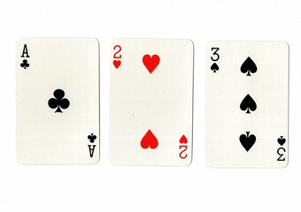 A hand of playing cards showing a run of three on a white background.