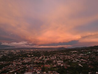 Escazu, Costa Rica sunset paints a vibrant skyline.