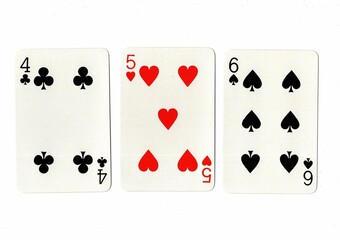 A hand of playing cards showing a run of three on a white background.