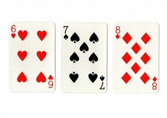 A hand of playing cards showing a run of three on a white background.