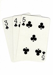 A hand of playing cards showing a run of three on a white background.