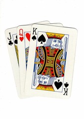A hand of playing cards showing a run of three on a white background.