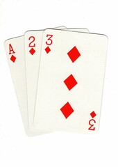 A hand of playing cards showing a run of three on a white background.