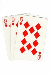 A hand of playing cards showing a run of three on a white background.