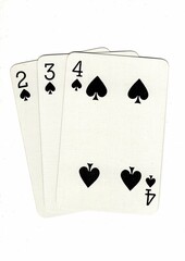 A hand of playing cards showing a run of three on a white background.