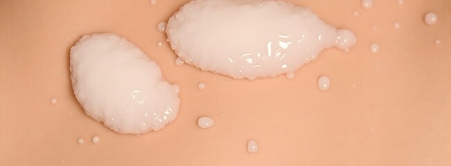 Fototapeta premium Close-up of moisturizing lotion on skin surface