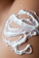 Obraz premium Creamy lotion applied on smooth skin surface for skincare