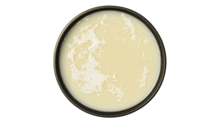 Creamy substance in shallow bowl on white surface