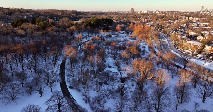 Winter Aerial Of The Arnold Arboretum and Boston Skyline at Sunset