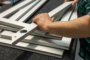 Aluminum profiles. Assembling aluminum frames in the factory