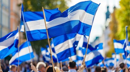Patriotic parade  enthusiastic crowd waving estonian flags in celebration of national pride