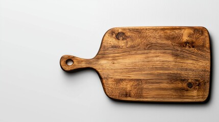 Natural wooden cutting board viewed from above, ideal for food preparation or serving in a kitchen setting.