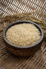 asian parboiled rice grains in rustic setting display in Cambodia