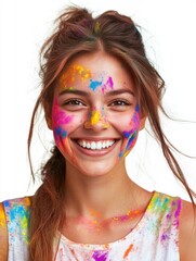 Naklejka premium Young woman laughing with face covered in vibrant color powder.