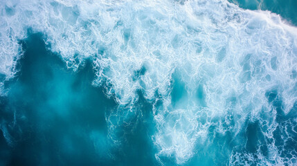 Fototapeta premium Beautiful aerial view of ocean waves with white foam in the turquoise sea, flat lay