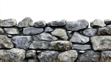 Stone wall with large rocks against clear sky
