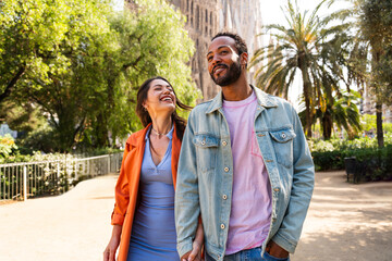 Multiracial beautiful happy couple of lovers dating in Barcelona