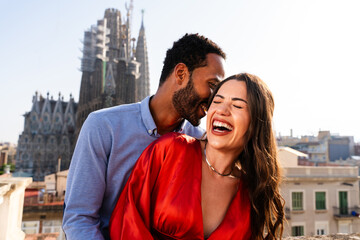 Multiracial beautiful happy couple of lovers dating in Barcelona
