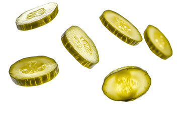 Isolated falling pickled cucumber slices captured on a clean white surface.