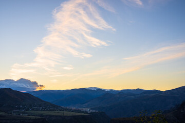 Golden Horizon: Sunset Over the Mountains