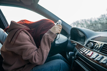 Woman in Car Feeling Unwell: A Moment of Distress