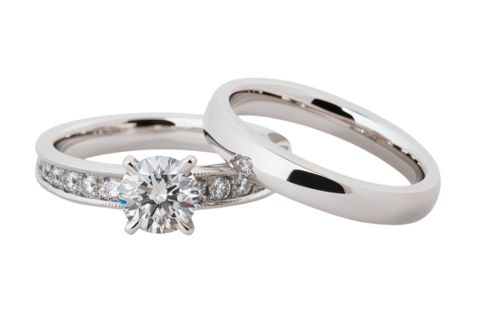 Closeup View Of Elegant Wedding Ring Set Featuring Sparkling Gemstone Center Stone