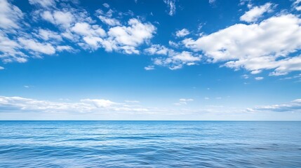 Expansive ocean view with calm waters under a beautiful blue sky scattered with fluffy clouds : Generative AI