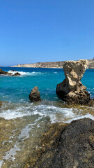 Rocks and sea blue sea