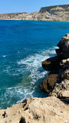 Rocks and sea waves ocean blue