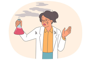 Woman scientist experienced failure when mixing reagents, holds smoking test tube in hands