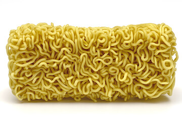 Block of dried yellowish instant noodles tightly packed and ready to be cooked.