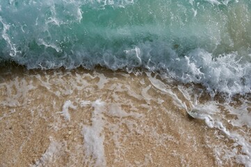 Waves to the sand