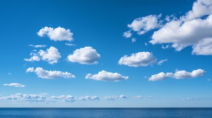 Obraz premium A vast blue sky scattered with fluffy white clouds reflecting over a tranquil ocean at daytime : Generative AI