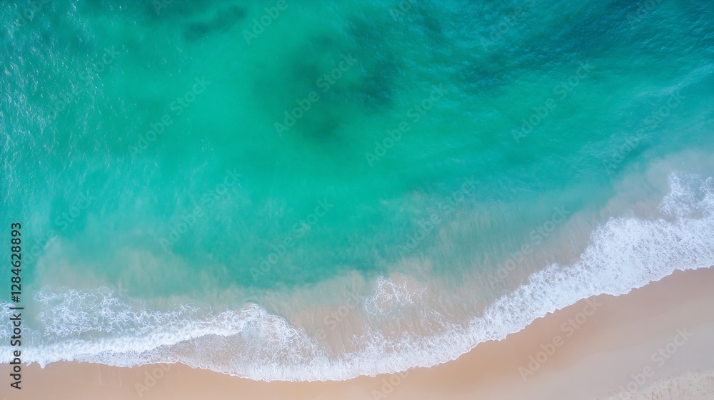 Aufkleber aerial view of pristine turquoise ocean waves gently lapping against the sandy shore under bright da
