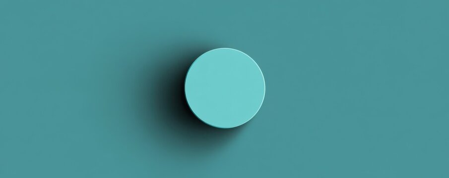 Minimalist design: elevated cyan sphere with soft shadow on blue background
