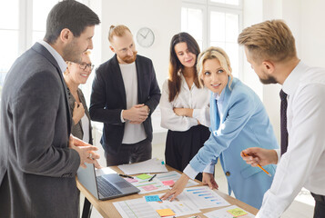 Business people discussing company finance growth with brainstorming analyzing data stat. Company employees working on a meeting with financial documents together. Teamwork concept.