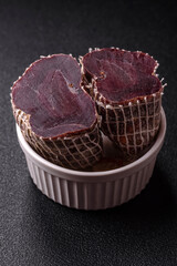 Smoked horse meat with salt, spices and herbs