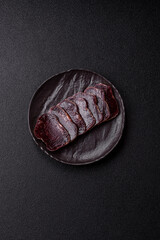 Smoked horse meat with salt, spices and herbs