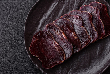 Smoked horse meat with salt, spices and herbs