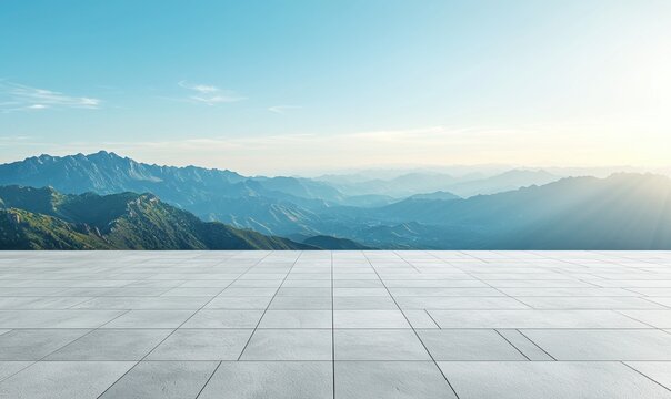 Open flat stone platform against a majestic mountain backdrop under a serene blue sky at dusk