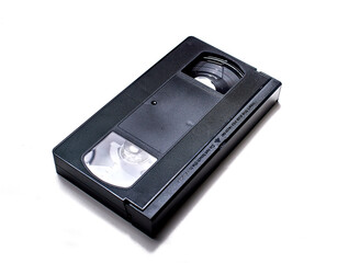 Obraz premium VHS cassette on a white background, representing retro media and vintage home entertainment nostalgia