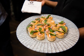Serving tray of sushi rolls.