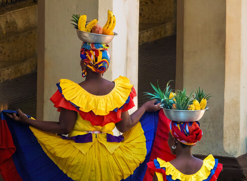 Palenqueras in the old town of Cartagena, Colombia. They perpetuate a centuries old tradition established by freed slave women from San Basilio de Palenque