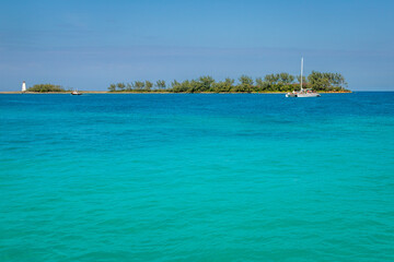 Exposure of Nassau entrance port, showing the light blue waters, the light blue is a response to sunlight reflecting off the sand and corals on the bottom, Bahamas