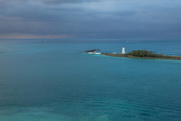 Exposure of Nassau entrance port, showing the light blue waters, the light blue is a response to sunlight reflecting off the sand and corals on the bottom, Bahamas