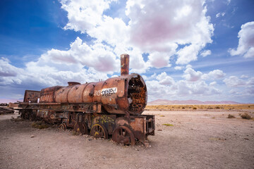 Fototapeta premium Train Cemetery, Cementerio de Trenes, Deserted Train Cemetery in Bolivia’s Salt Plains - Uyuni Salt Flat, Bolivia